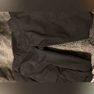 Under Armour black work pants.